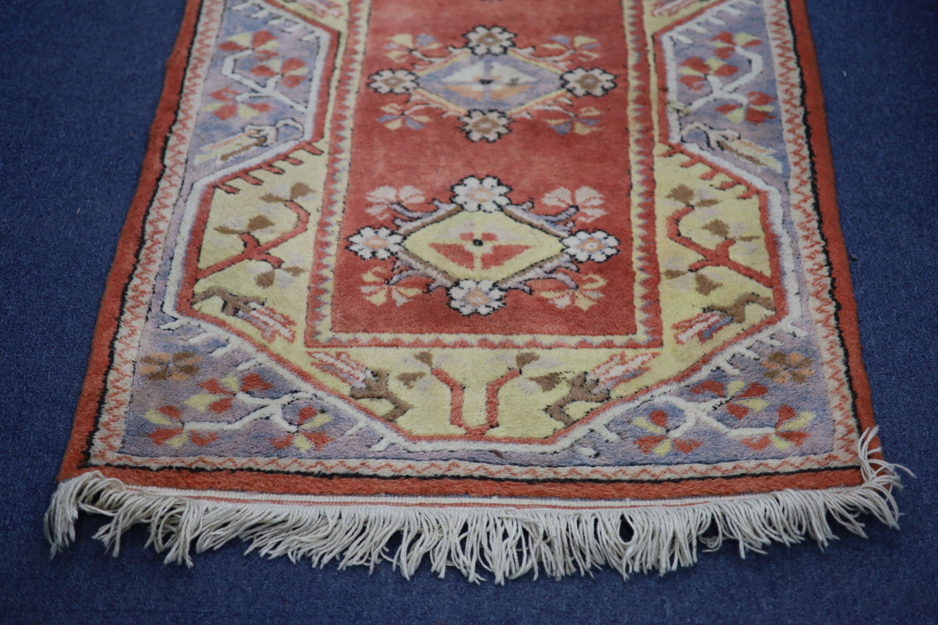 Two Caucasian design runners, larger 350 x 74cm